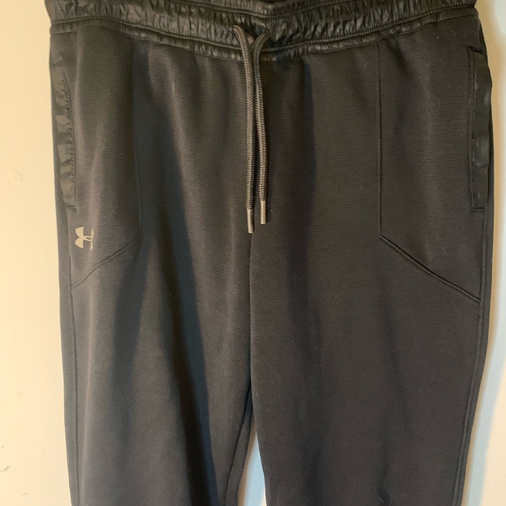 Black under armour dry wick pants. Extra warm.